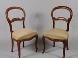pair of antique mahogany dining chairs with upholstered seats