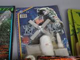 several different toys that are on a table