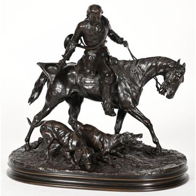 statue en bronze représentant un homme à cheval accompagné d'un chien