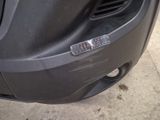 a close up of a car ' s bumper with a sticker on it