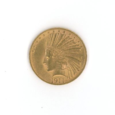 une image d'une pièce d'or sur une surface blanche