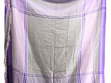 purple and white plaid scarf with fringes on a white background