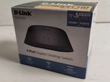 the box of the d - link smart desktop device is open on the table