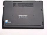 a laptop that is sitting on a white surface