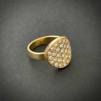 DINH VAN. Bague en or jaune 750°°° (tête d'aigle), chaton fo…