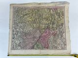 an old map of the city of new york with a ruler