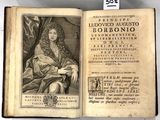 un vieux livre sur lequel figure l'image d'un homme assis sur une chaise