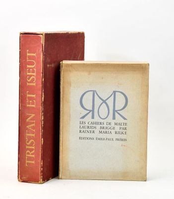 two books sitting next to each other on a white surface