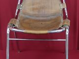 two chairs that are sitting next to each other