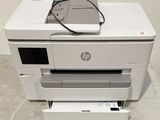 a printer that is sitting on top of a table