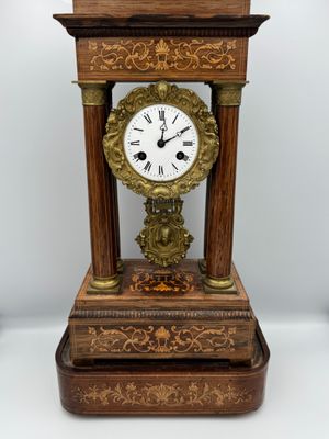 a clock that is sitting on top of a table