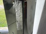 a tall mirror that is sitting on the floor
