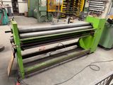 a machine that is sitting on a table in a factory