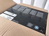 a box that has a laptop inside of it