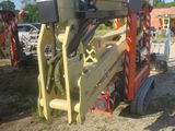 a picture of a crane that is sitting in the dirt
