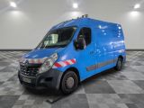the blue van is parked on a checkered floor in the garage