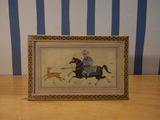 a picture of a picture of a man riding a horse with a dog