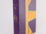 the book is purple and yellow with a yellow stripe on the cover