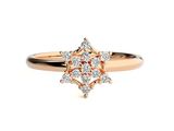 a close up of a diamond ring on a white background