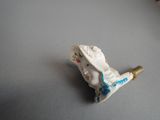 a small figurine of a horse on a table