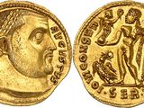 a gold coin with an image of a man and a woman on it