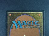 the back cover of a card game with a picture of a man on a horse