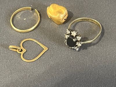 three rings that are sitting on a table