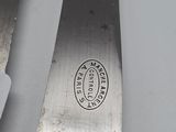 a close up of a knife on a table