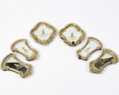 six miroirs anciens en argent et en verre, ornés de motifs décoratifs