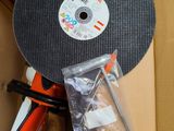 a box with a disc and a pair of scissors in it