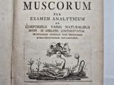 an old book with a picture of a mermaid on it
