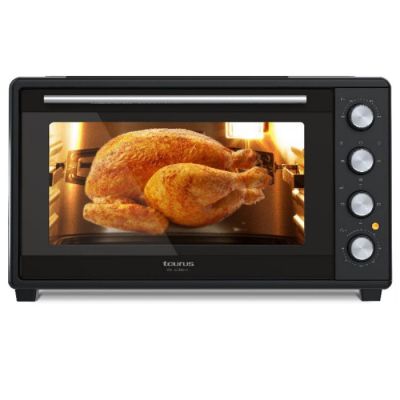 a picture of an oven with a chicken in it