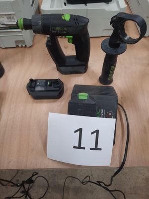 a lot of tools on a table with a price tag