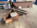 a metal object that is sitting on the ground