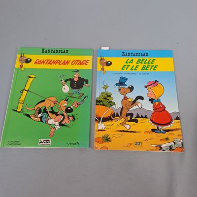 trois livres pour enfants sont posés sur une table les uns à côté des autres