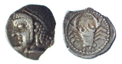 une image représentant une pièce d'argent sur laquelle figure le portrait d'une femme