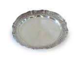 an antique silver plate on a white background with a white background