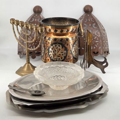 a lot of plates and silverware on the table