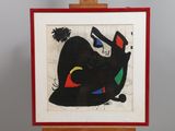 painting of a black cat on a wooden easel with a red frame