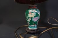Lot de deux vases en faïence à décor de végétaux et oiseaux … (photo 2)