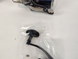 a picture of a small fishing reel on a table
