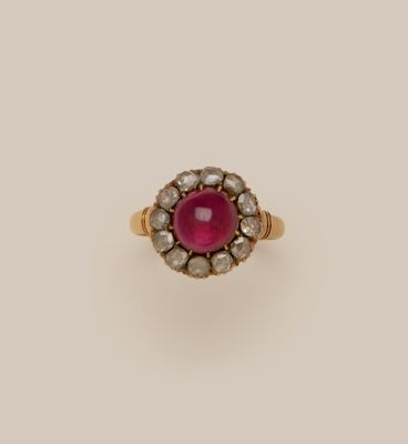 a ruby and diamond cluster ring