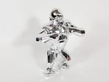 a silver figurine of a man holding a baseball bat