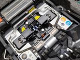 an image of the inside of a car with the engine compartment open
