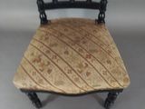 a miniature chair that is sitting on a table