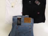 three pairs of levi ' s t - shirts and a pair of levi ' s jeans