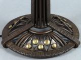 a close up of a table with a lamp on it