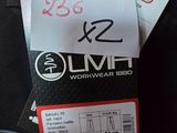 a pair of black pants with a red and white label on them
