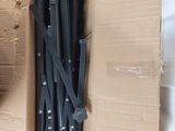 a cardboard box with a bunch of knives inside of it