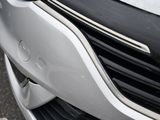 a close up view of a car ' s front bumper